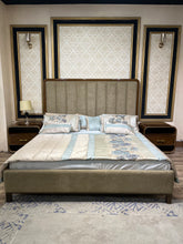 Luxury Brass-Framed Bed with Curved Modern Design