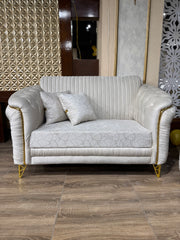 Cream Ribbed Upholstery with Gold Metal Accents & Trim