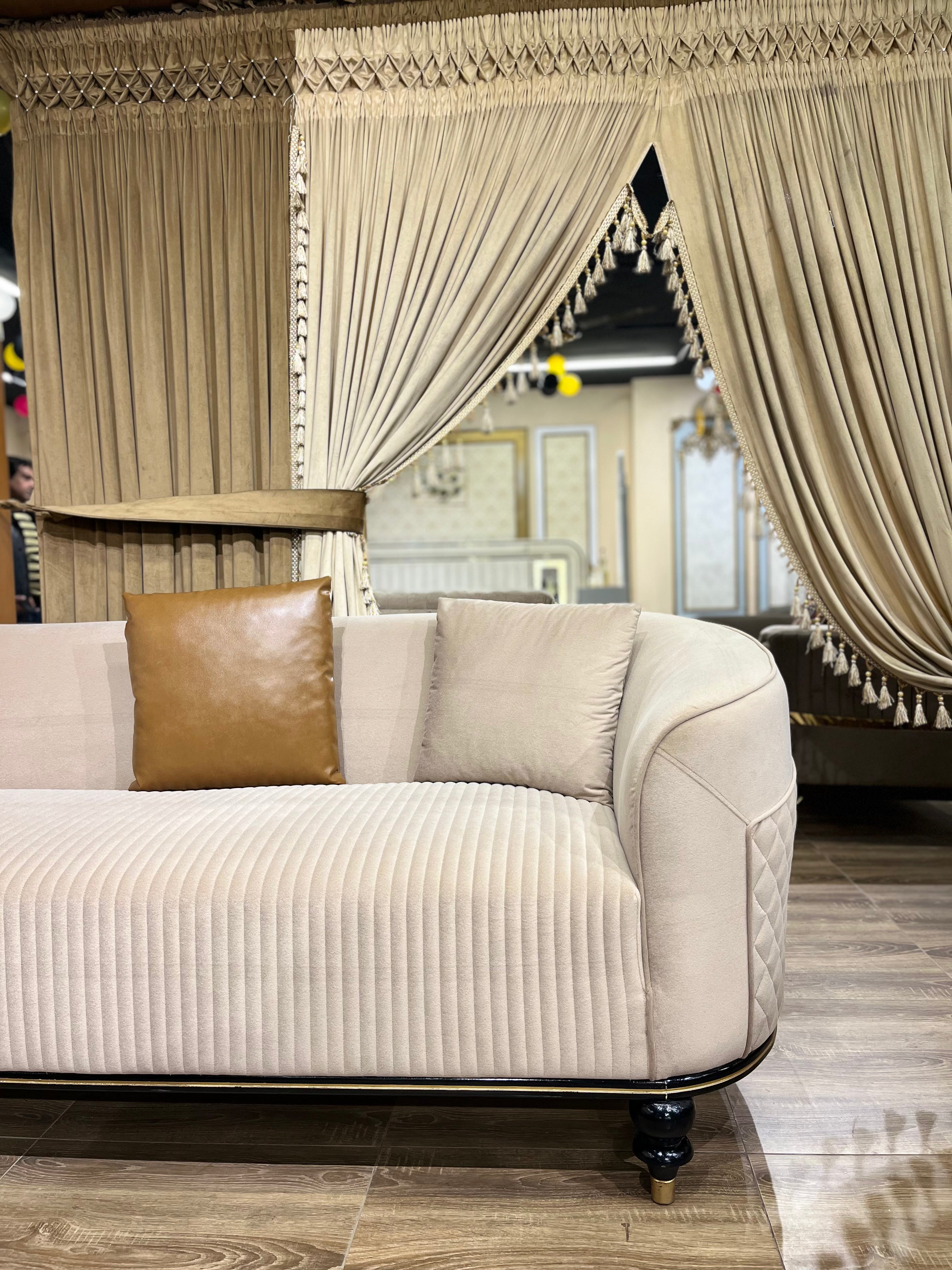 Elegant Curved Sectional Sofa with Quilted Details