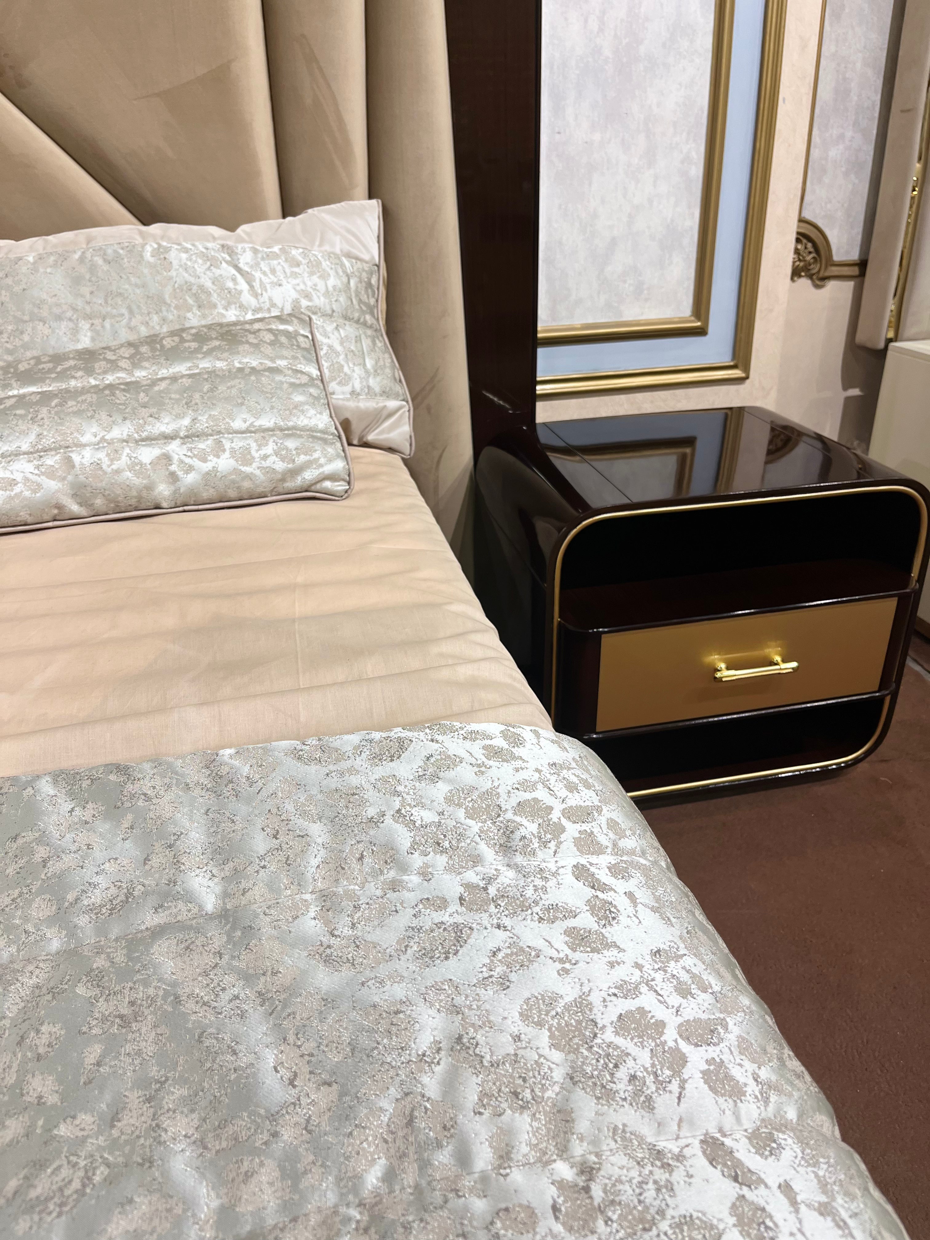 Luxury Black & Gold Bed with Curved Modern Design