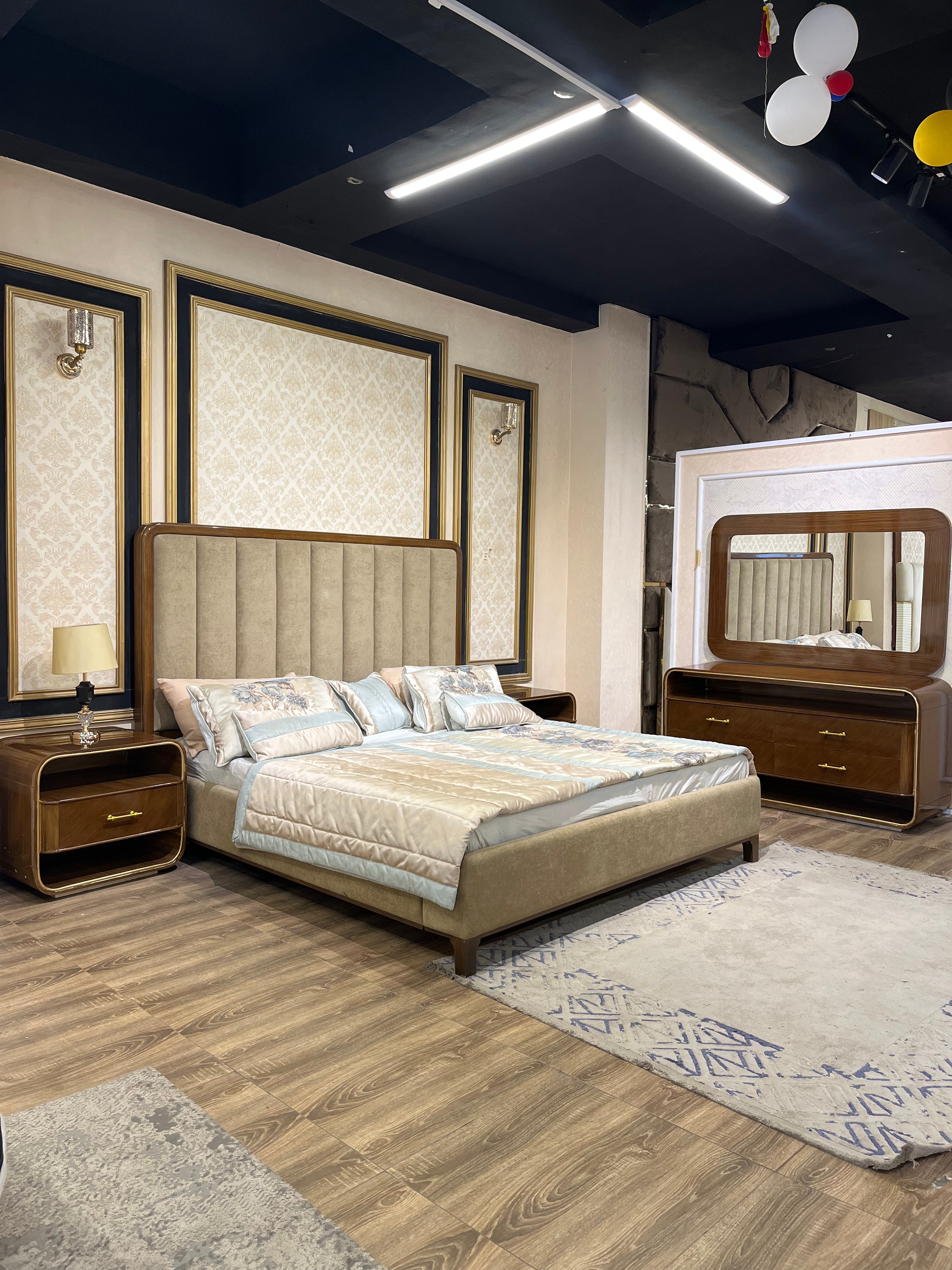 Luxury Brass-Framed Bed with Curved Modern Design