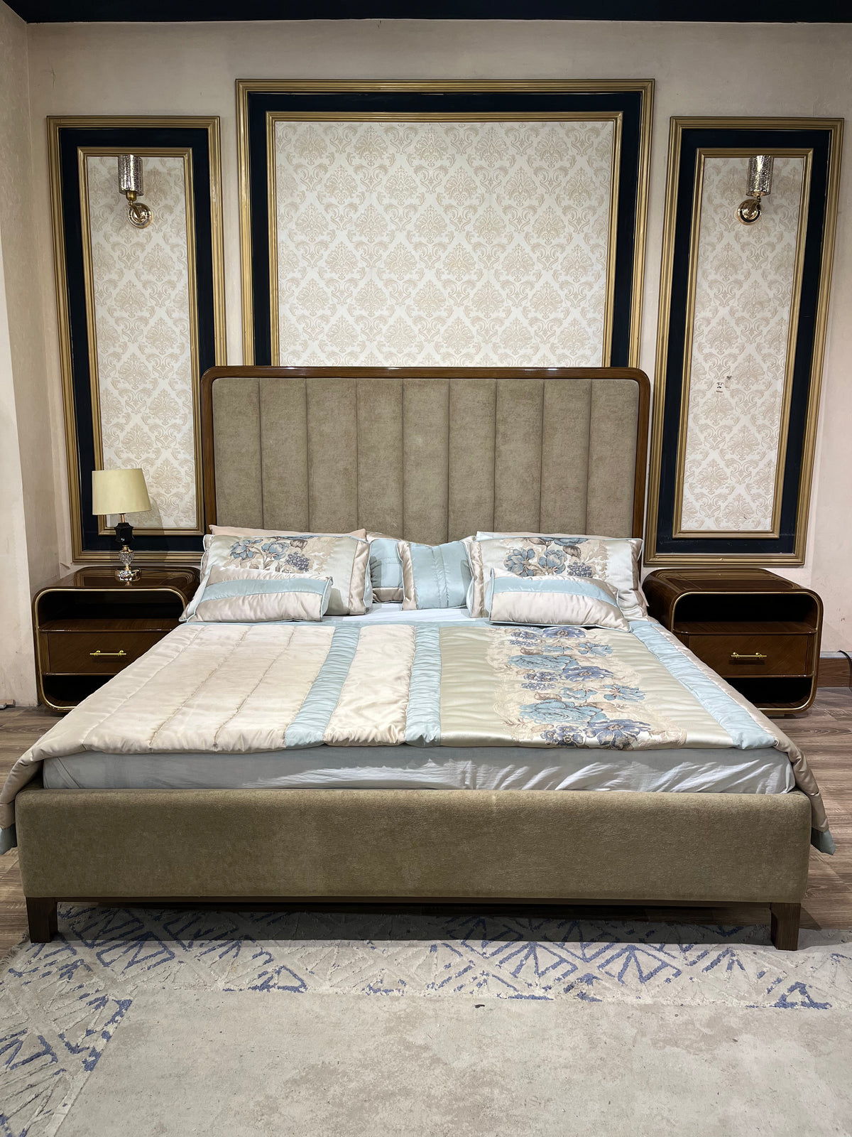 Luxury Brass-Framed Bed with Curved Modern Design