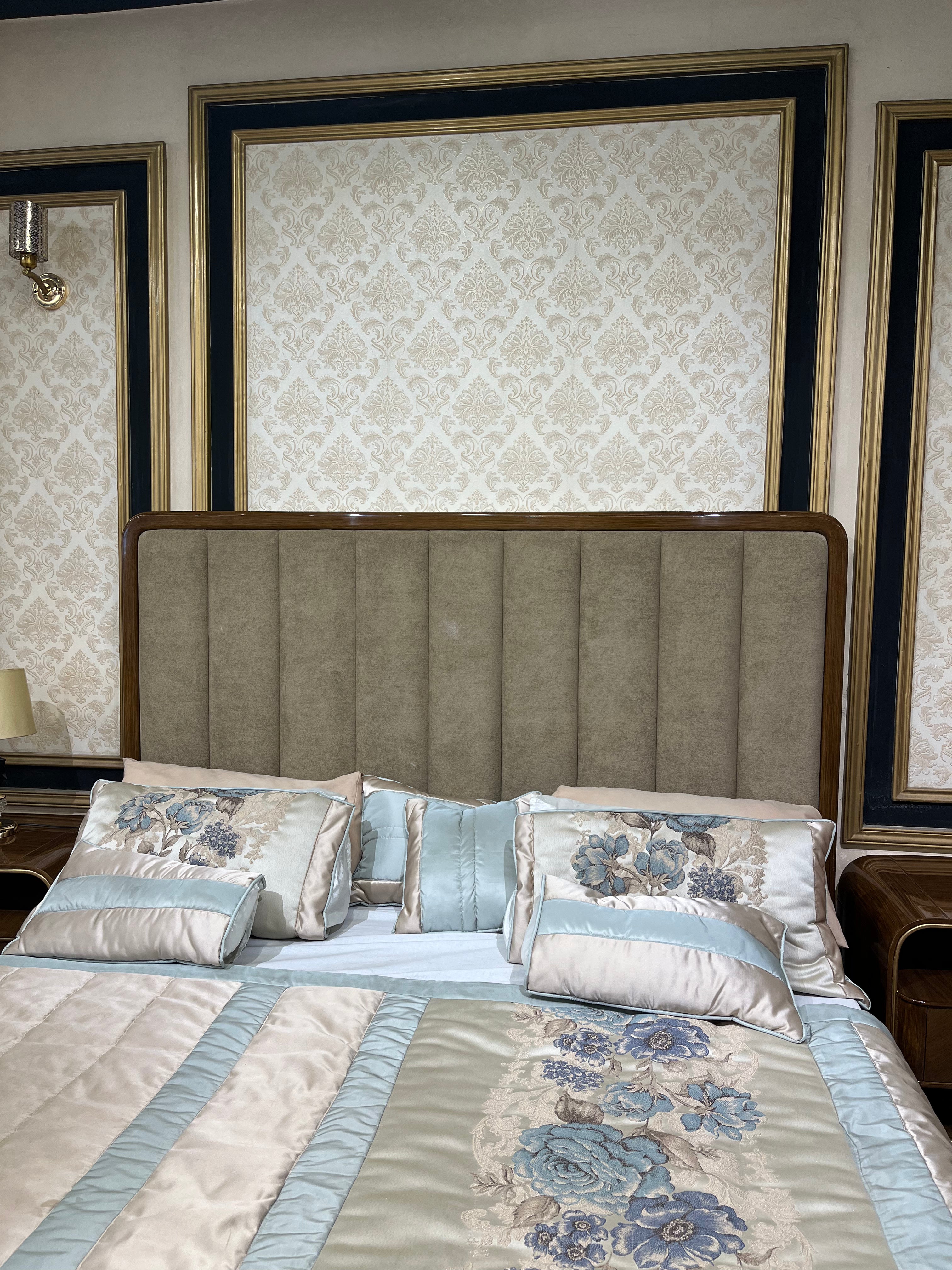 Luxury Brass-Framed Bed with Curved Modern Design