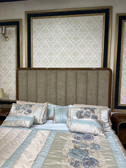 Luxury Brass-Framed Bed with Curved Modern Design