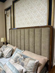 Luxury Brass-Framed Bed with Curved Modern Design