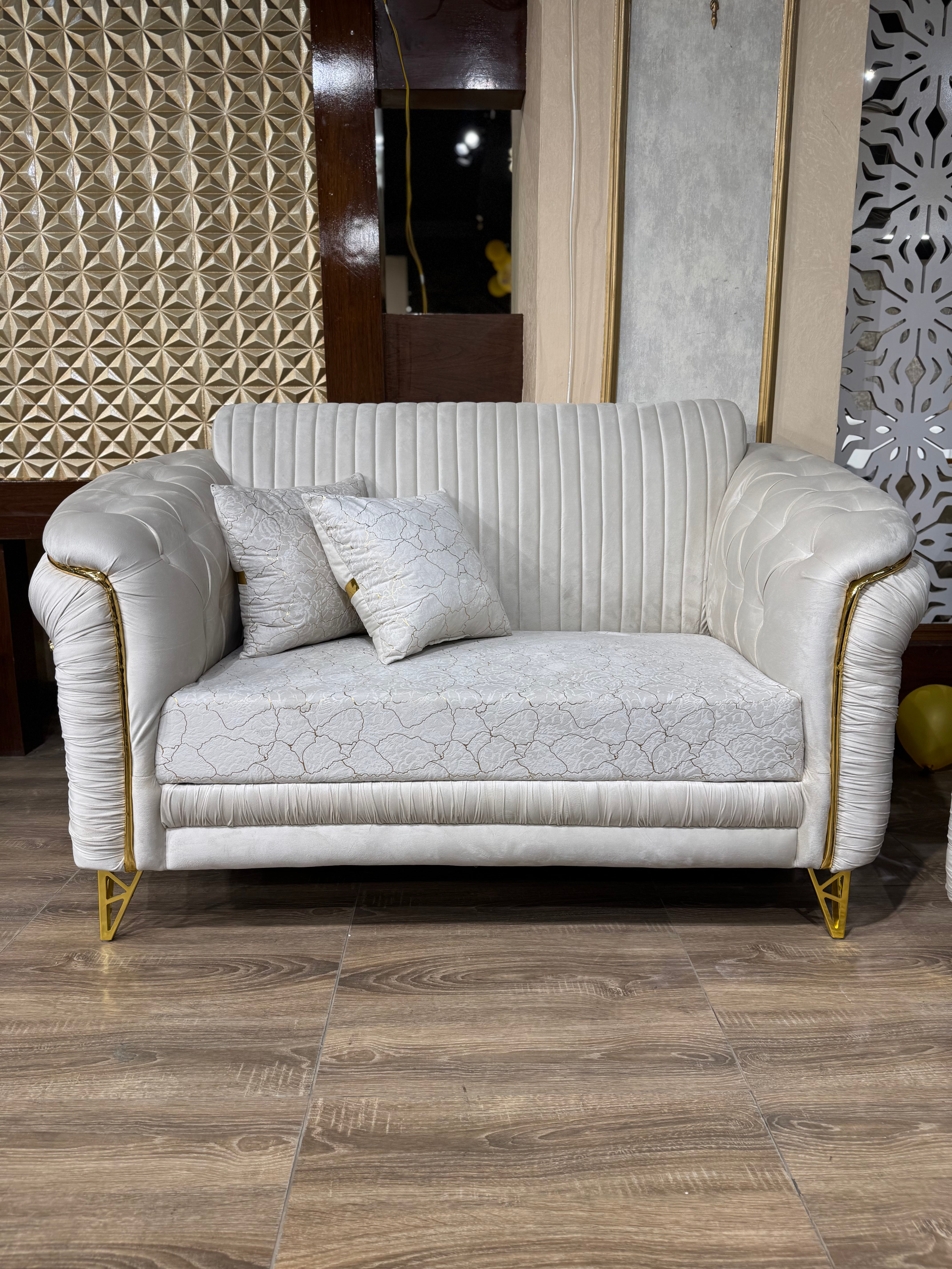 Cream Ribbed Upholstery with Gold Metal Accents & Trim